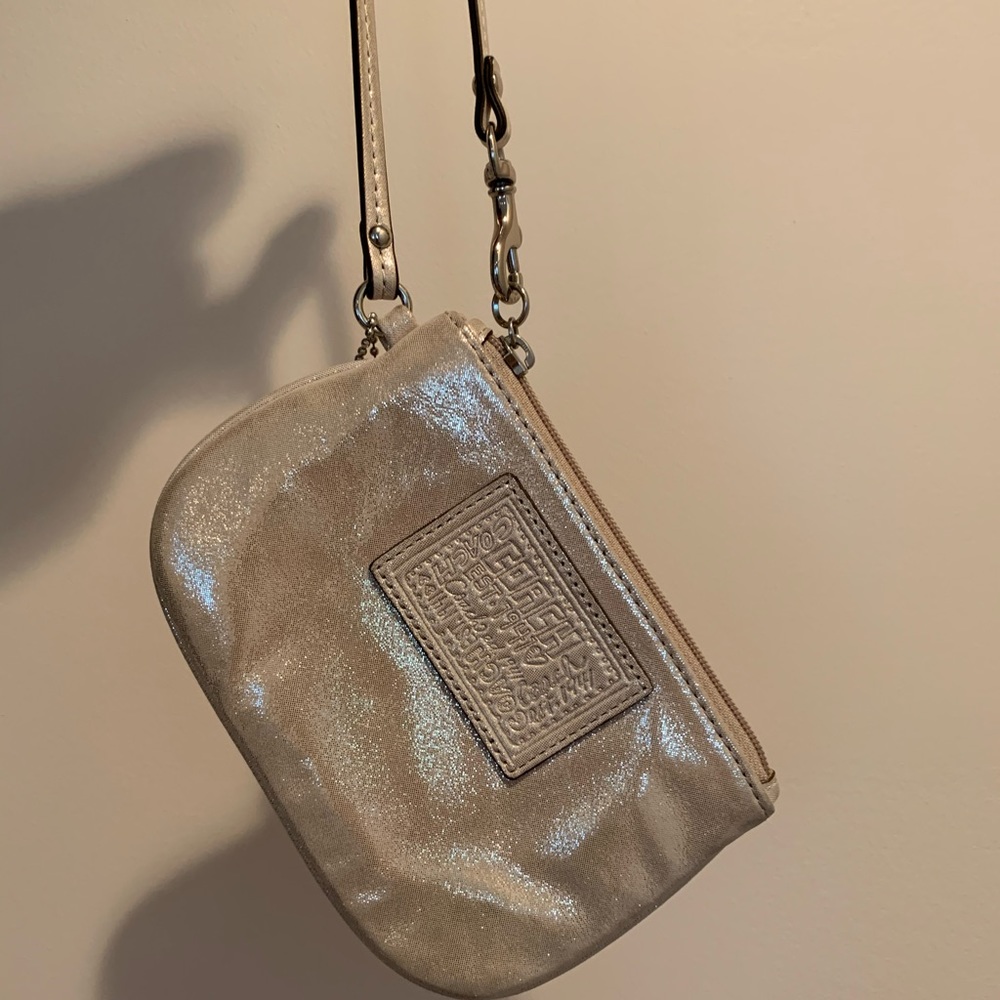 Coach sparkly cream wristlet
